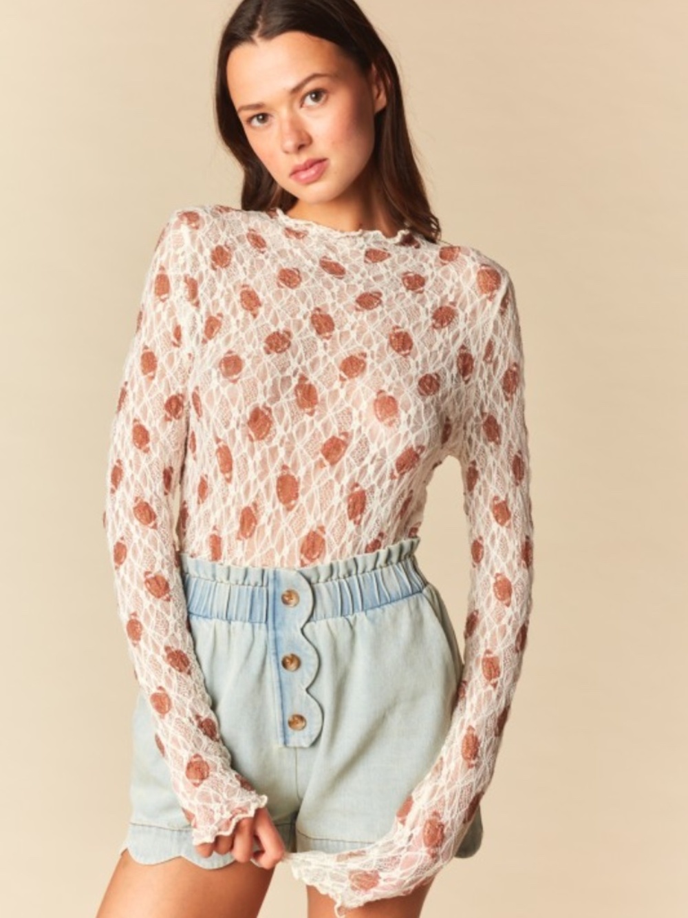 “The Fynn" Football Sheer Lace Mock Neck Top